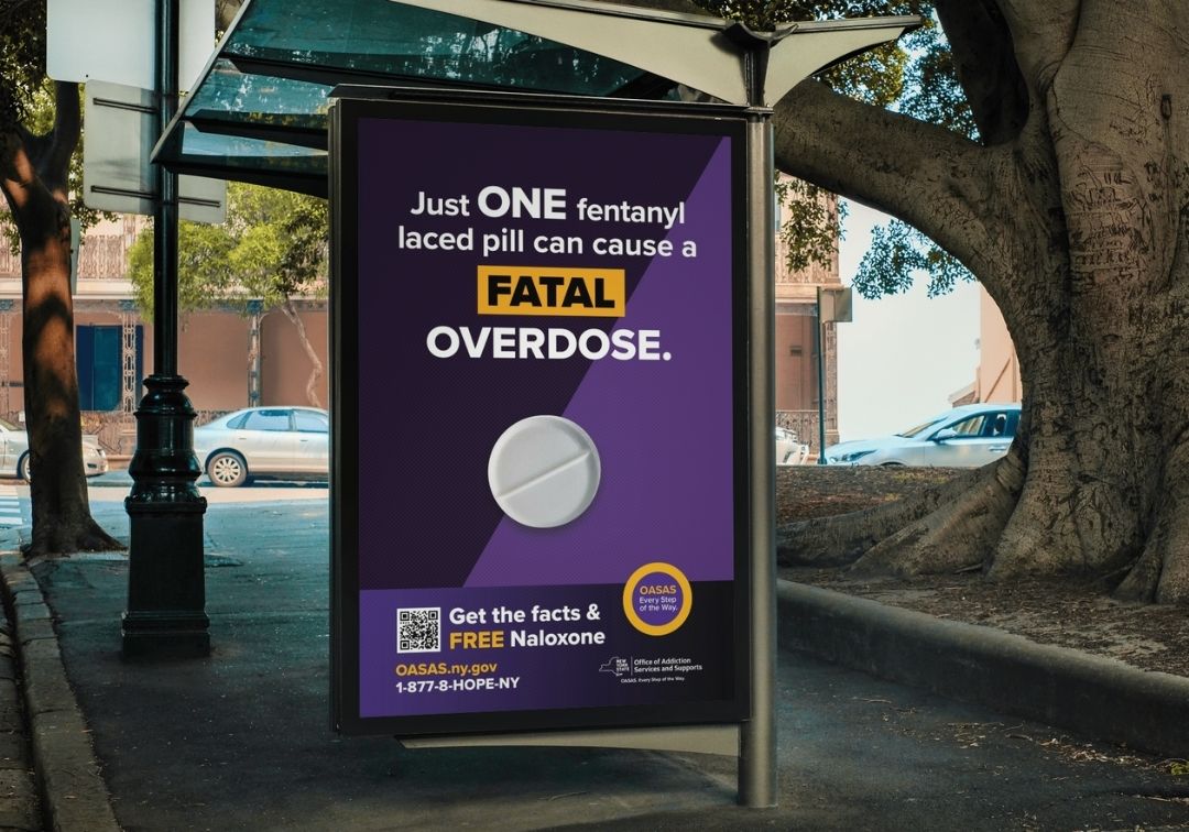 Mockup of OASAS Fentanyl overdose prevention ad at bus stop